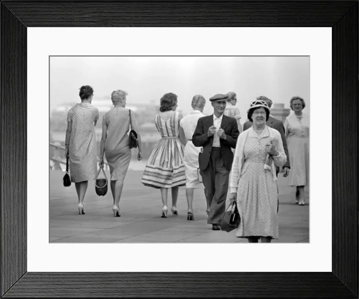 Framed Print : A group of women walk along the seafront at Brighton July 1958