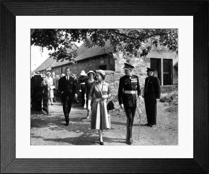 Framed Print : Queen Elizabeth II and the Duke of Northumberland followed by Prince Philip