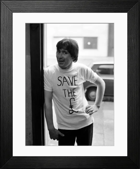 Framed Print : Lead singer of the Troggs pop group, Reg Presley wearing the T-shirts on Oxford St Framed Print : Lead singer of the Troggs pop group, Reg Presley wearing the T-shirts on Oxford St