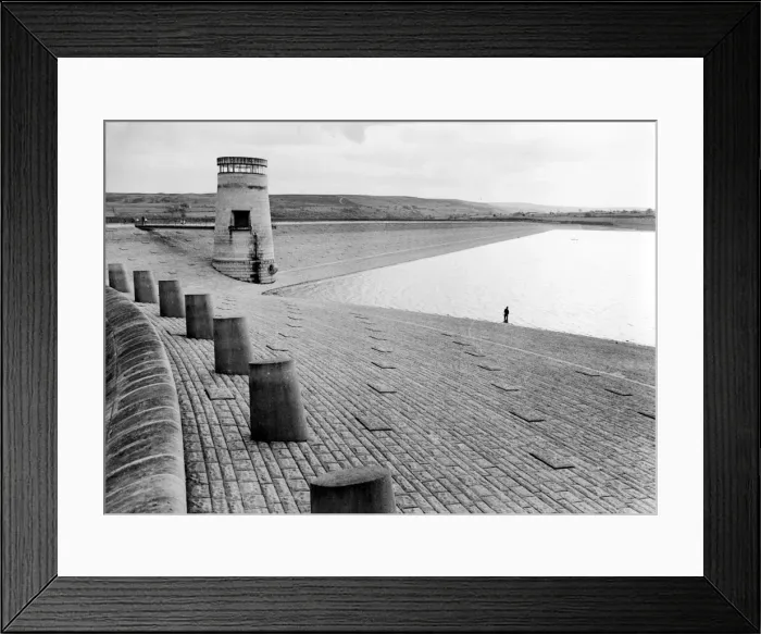 Framed Print : No fighting over pitches at this stretch of water as anglers enjoy a spot of fishing