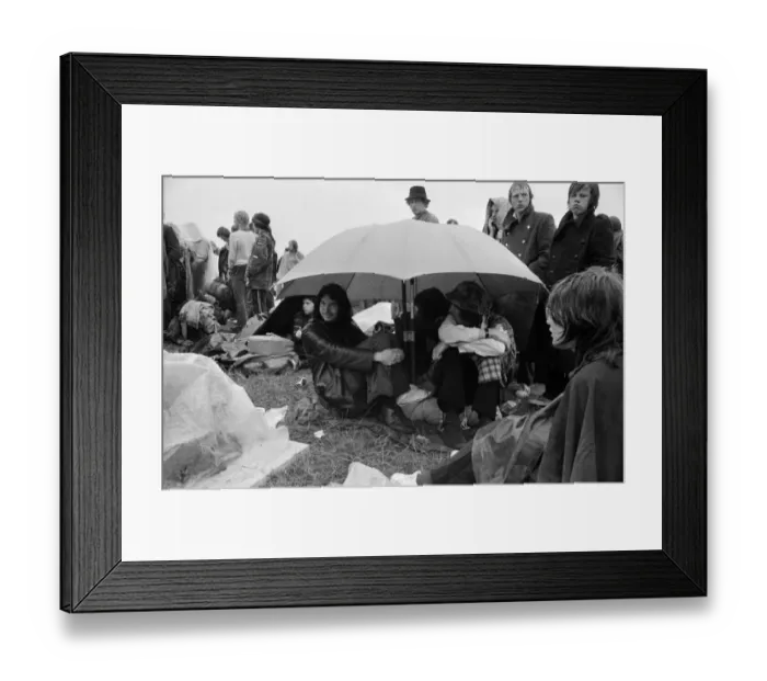 Framed Print : Music Fans in the rain at the Bath Festival of Blues & Progressive Music Framed Print : Music Fans in the rain at the Bath Festival of Blues & Progressive Music