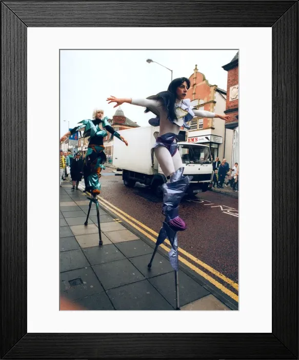 Framed Print : Stiltwalkers Full tilt at the North festival at Chester-le-Street in 1993 Framed Print : Stiltwalkers Full tilt at the North festival at Chester-le-Street in 1993