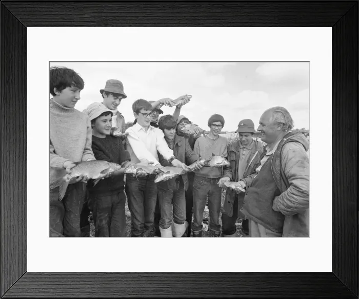 Framed Print : Not an apple for teacher but a big fat fish. Mr Tom Thomson a civil engineer who lives in Framed Print : Not an apple for teacher but a big fat fish. Mr Tom Thomson a civil engineer who lives in