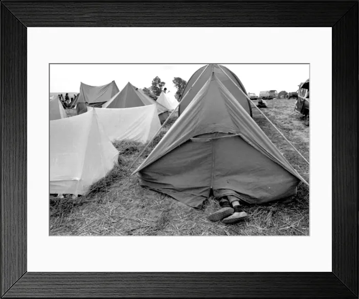 Framed Print : Feet sticking out of a tent at the Isle of Wight Pop Festival 30th August 1969 Framed Print : Feet sticking out of a tent at the Isle of Wight Pop Festival 30th August 1969