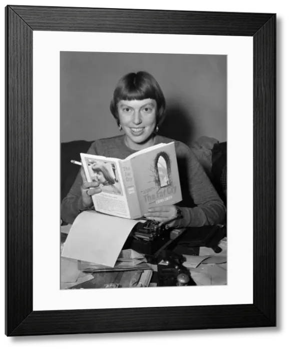 Framed Print : Children writer Emma Smith at home with her typewriter. 1950 Framed Print : Children writer Emma Smith at home with her typewriter. 1950