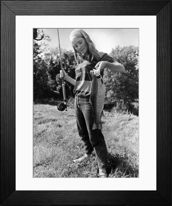 Framed Print : Celia Reade, aged 14 seen here shortly after landing a trout following a fishing lesson Framed Print : Celia Reade, aged 14 seen here shortly after landing a trout following a fishing lesson