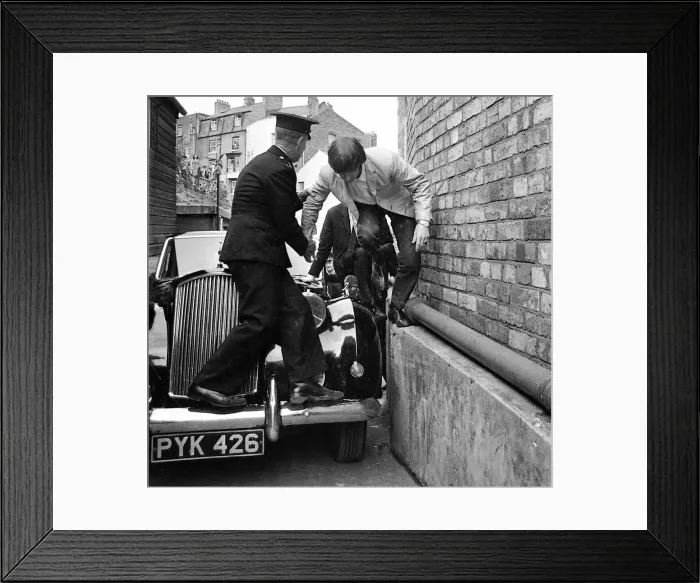 Framed Print : Ringo Starr is helped as limo gets stuck at entrance to Futurist theatre in Scarborough