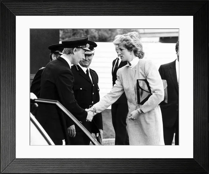 Framed Print : Princess Diana meets fire crew who attended the scene of the British Airtours passenger