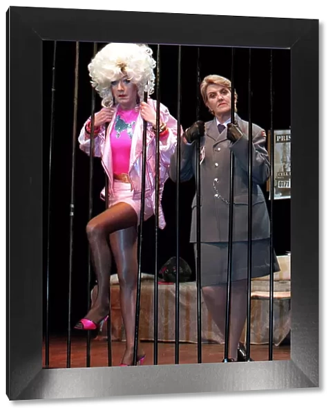 Lily Savage head through the bars she stars in Prisoner cell block H the musical with