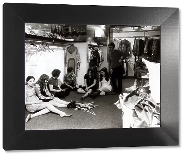 Women resting after hard day in shop - 1968 young people, shop workers