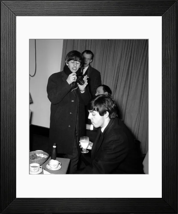 Framed Print : The Beatles Leaving for New York, Ringo Starr taking pictures of Paul McCartney