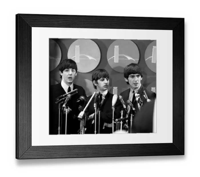 Framed Print : The Beatles answer questions for newsmen and journalists in New York after their arrival