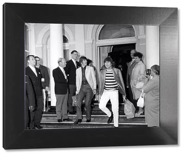 John Lennon and and Ringo Starr of The Beatles leaving the Imperial Hotel in Blackpool