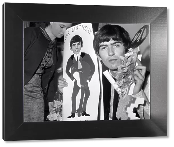 George Harrison, celebrating his 21st birthday. 25 February 1964