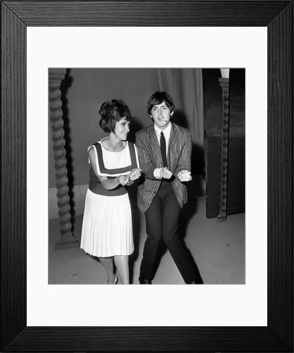 Framed Print : Pop Group The Beatles July 1964. Paul McCartney with singer Chita River during Framed Print : Pop Group The Beatles July 1964. Paul McCartney with singer Chita River during