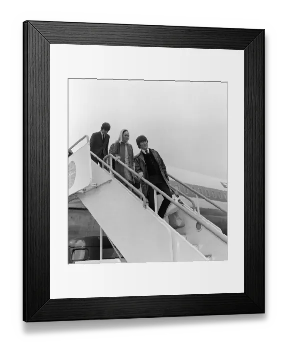 Framed Print : John Lennon and his girlfriend Cynthia 26 May 1964 along with George Harrison get off of