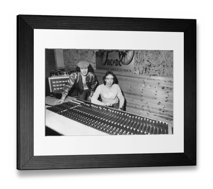 Framed Print : Brian Johnson, lead singer of the rock group AC  /  DC, with John Craig at the Lynx Studios