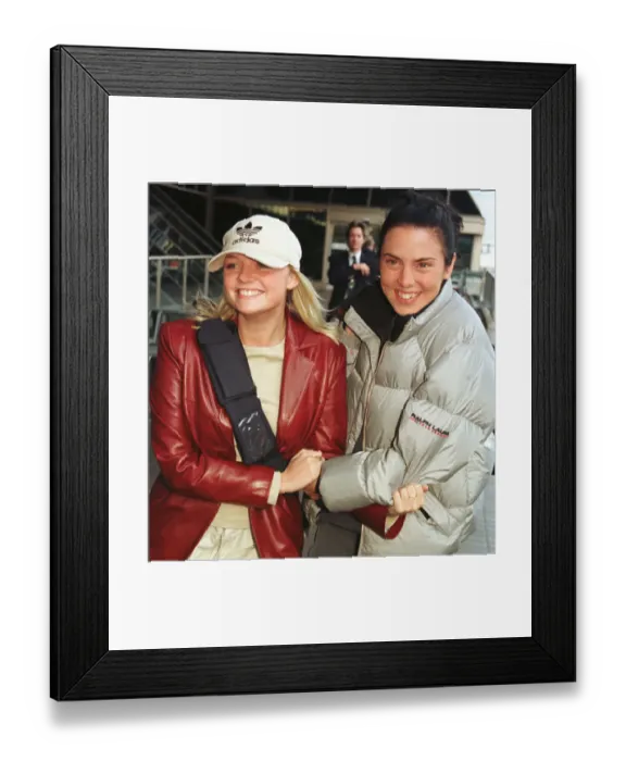 Framed Print : Spice Girls Singers Emma Bunton and Mel C November 1998 leave Heathrow Airport for