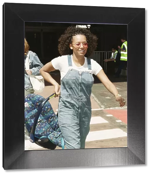 Mel B Scary Spice arrives at Heathrow Airport June 1999 Mel B of Spice Girls