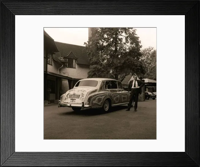 Framed Print : The chauffeur of The Beatles singer John Lennon standing beside Lennon