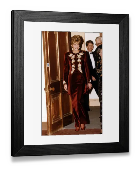 Framed Print : Princess Diana arrives for the Nutcracker ballet. She is wearing a burgundy velvet