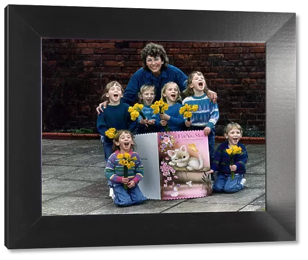 Janet Walton with her sextuplets at their home in Wallasey Wirral DBase