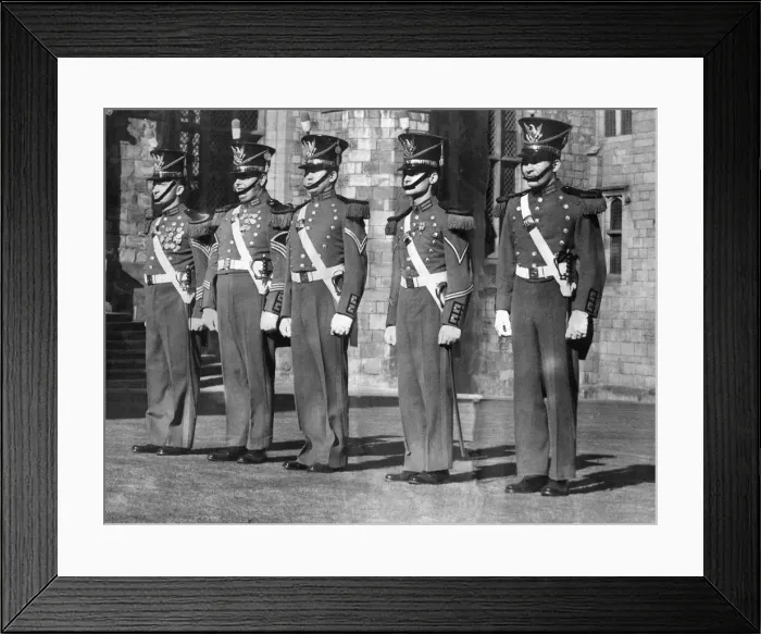 Framed Print : Private First Class James M. Kelly (left) wearing the historic uniform of the famous Framed Print : Private First Class James M. Kelly (left) wearing the historic uniform of the famous