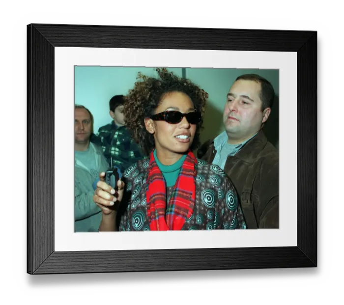 Framed Print : SCARY SPICE AT AIRPORT APRIL 1998 Spice Girls Mel B wearing a tartan scarf