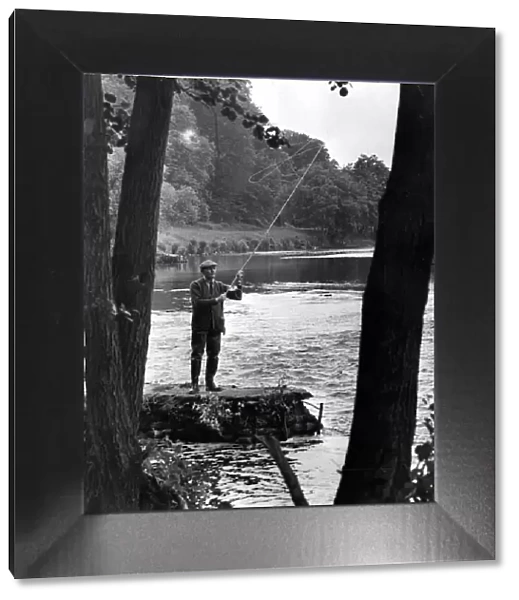 Fishing - Baron Van Moyland casting for Salmon on his Usk river beat where the fish are