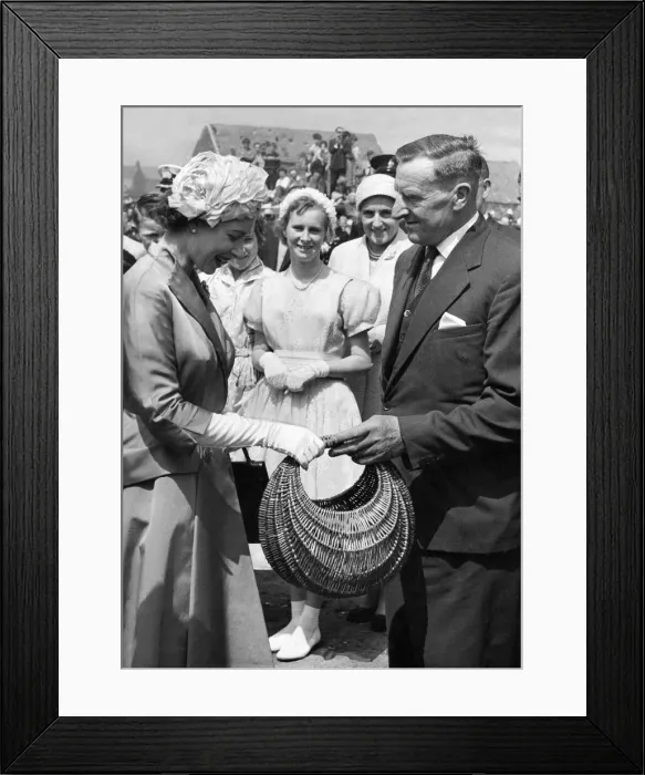 Framed Print : Queen Elizabeth II is presented with a willow basket by Mr J Tough during her visit to Framed Print : Queen Elizabeth II is presented with a willow basket by Mr J Tough during her visit to