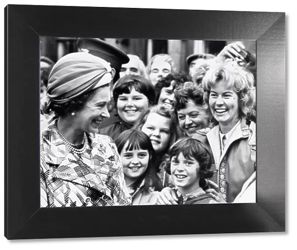 Queen Elizabeth II during a visit to Hexham Abbey meeting crowds of well- wishers