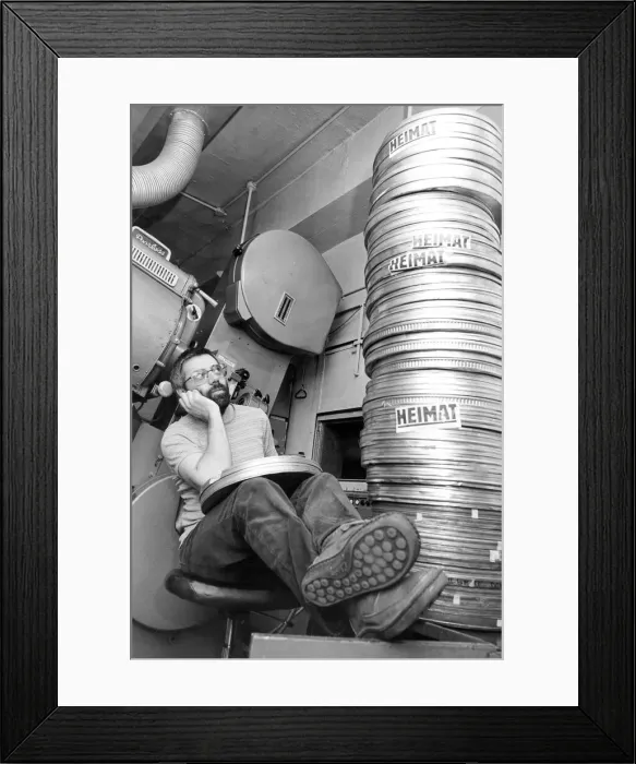 Framed Print : Cinema projectionist Ray Reed at the Tyneside Cinema with the longest feature film ever