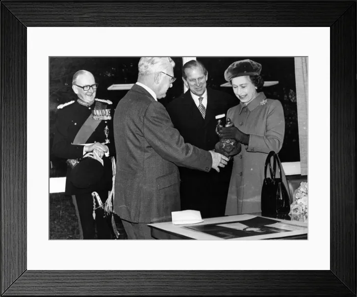 Framed Print : Queen Elizabeth II and Prince Philip visits Newcastle - Coun Les Watson presents