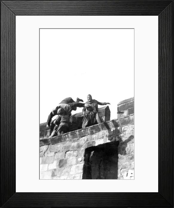 Framed Print : Actors and stunt men fighting on the wall of Alnwick Castle in 1981 Framed Print : Actors and stunt men fighting on the wall of Alnwick Castle in 1981