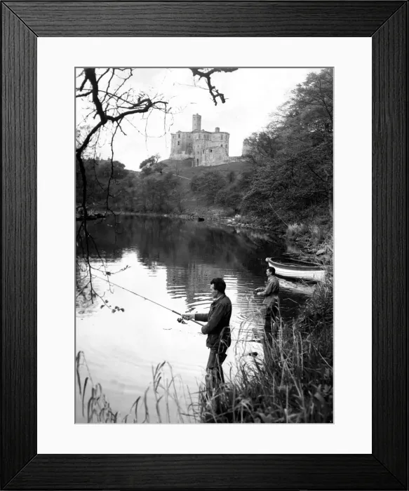 Framed Print : A peaceful scene as anglers try to lure the elusive salmon from the River Coquet below Framed Print : A peaceful scene as anglers try to lure the elusive salmon from the River Coquet below