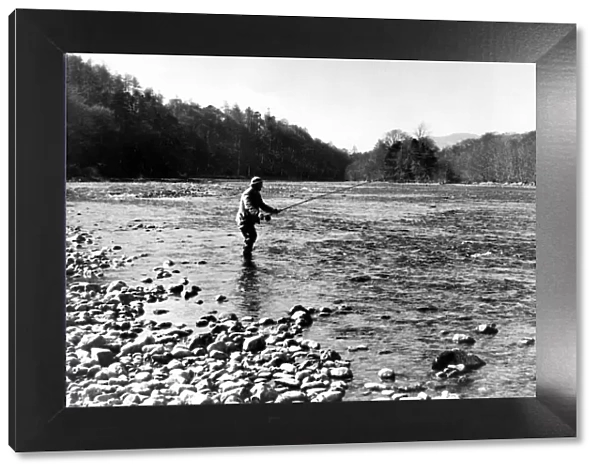 A men enjoys a relaxing day angling 01  /  05  /  79 circa