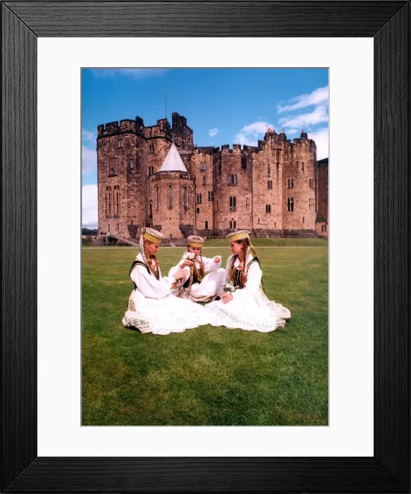 Framed Print : The first arrivals for the Alnwick Music Festival relax on the lawn of the Castle Framed Print : The first arrivals for the Alnwick Music Festival relax on the lawn of the Castle