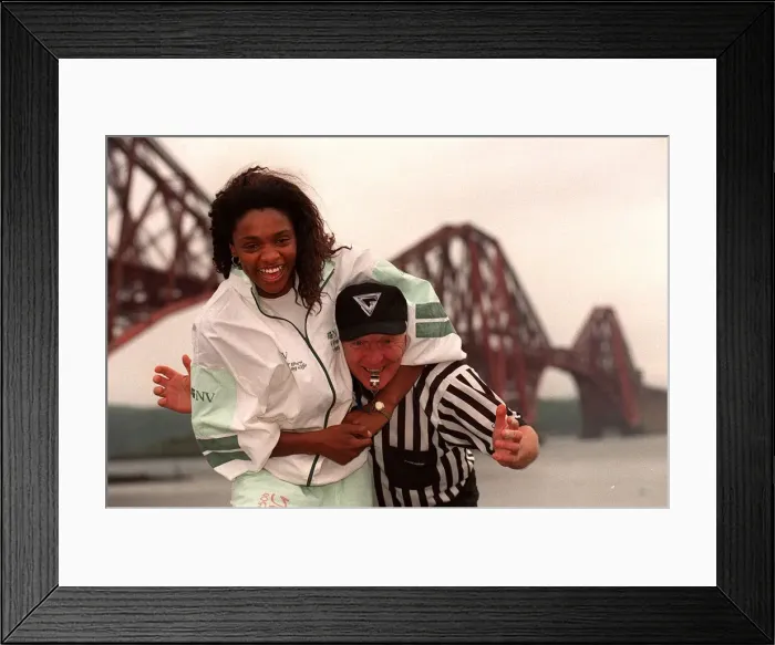 Framed Print : Gladiator Rocket ( Pauline Richards) gets a head lock on referee John Anderson with Framed Print : Gladiator Rocket ( Pauline Richards) gets a head lock on referee John Anderson with