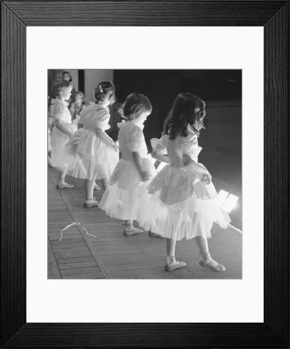 Framed Print : Four young ballerinas seen here performing a scene from the ballet Sleeping Beauty Framed Print : Four young ballerinas seen here performing a scene from the ballet Sleeping Beauty