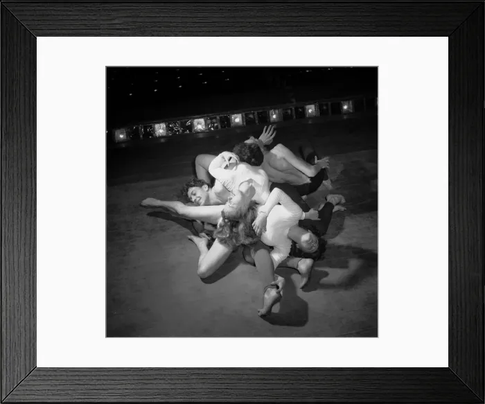 Framed Print : A tangle of bodies during the ballet sequence from the play Uranium 235 representing
