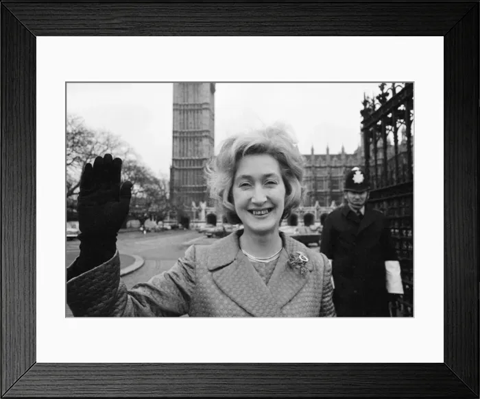 Framed Print : Scottish Nationalist MP Winnie Ewing waves as she stands outside the House of Commons Framed Print : Scottish Nationalist MP Winnie Ewing waves as she stands outside the House of Commons