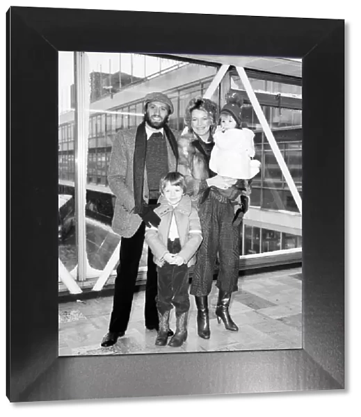 Bee Gees Singer Maurice Gibb with his family at Heathrow Airport before leaving for