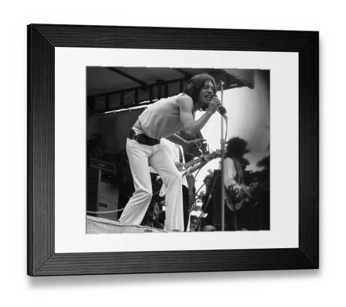 Framed Print : Rolling Stones: Mick Jagger singing to huge crowds during a pop concert at Hyde Park