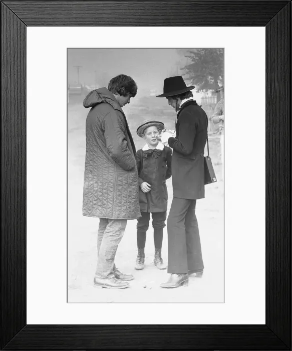 Framed Print : Rolling Stones: Mick Jagger signs an autograph for a girl who also plays a part in Ned Framed Print : Rolling Stones: Mick Jagger signs an autograph for a girl who also plays a part in Ned