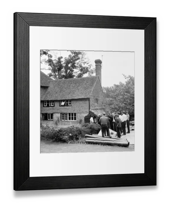 Framed Print : Rolling Stones: Brian Jones death. Tom Keylock, Stones gofer, outside Cotchford Farm
