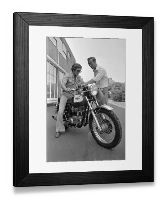 Framed Print : Grand Prix motorcycle road racer Phil Read sits on an Norton Villiers Triumph Bonneville Framed Print : Grand Prix motorcycle road racer Phil Read sits on an Norton Villiers Triumph Bonneville