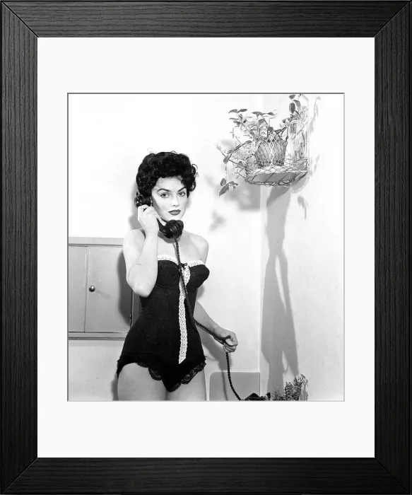Framed Print : Pauline Shepherd singer talking on / holding telephone, wearing sexy black lingerie Framed Print : Pauline Shepherd singer talking on / holding telephone, wearing sexy black lingerie