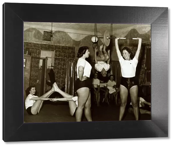 Women Exercising - July 1950 Stretching weight lifting