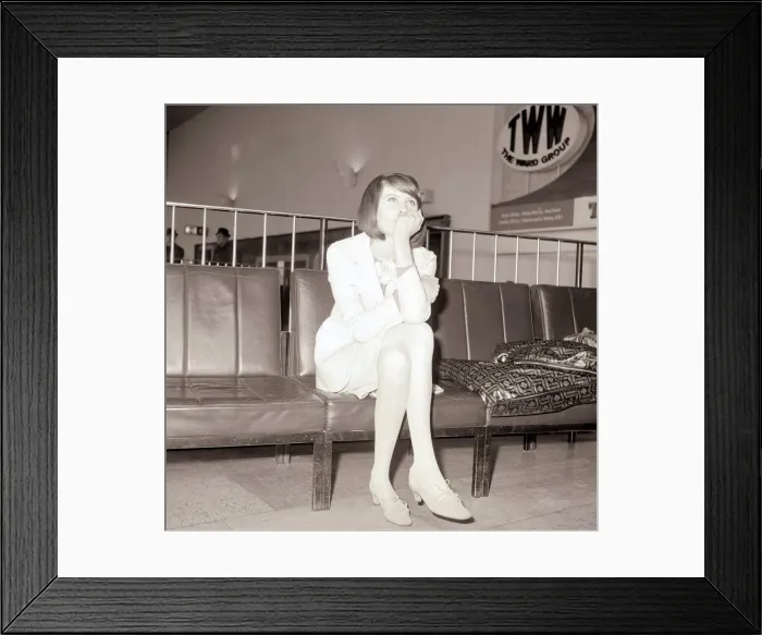Framed Print : Sandie Shaw on her 19th birthday in a pink suit at London Airport bound for Paris to