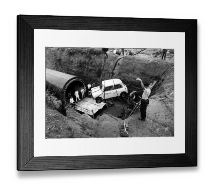 Framed Print : A Mini is lowered into Coventry sewers during the filming of The Italian Job Framed Print : A Mini is lowered into Coventry sewers during the filming of The Italian Job